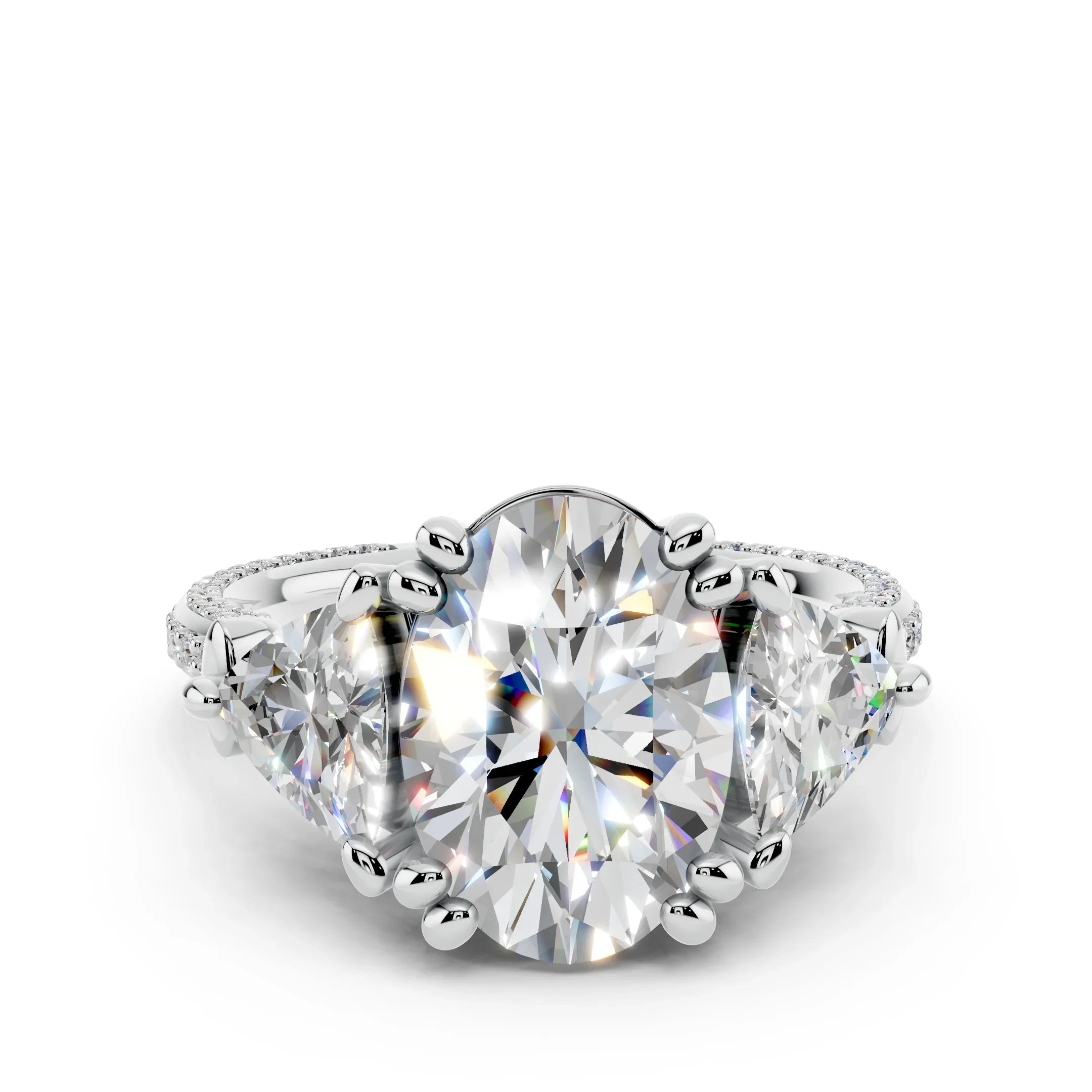 Oval cut three-stone diamond engagement ring in white gold with pavé band