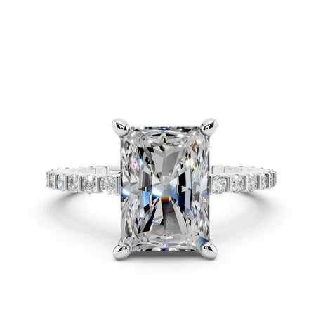 Radiant cut diamond engagement ring with diamond band set in white gold, front view