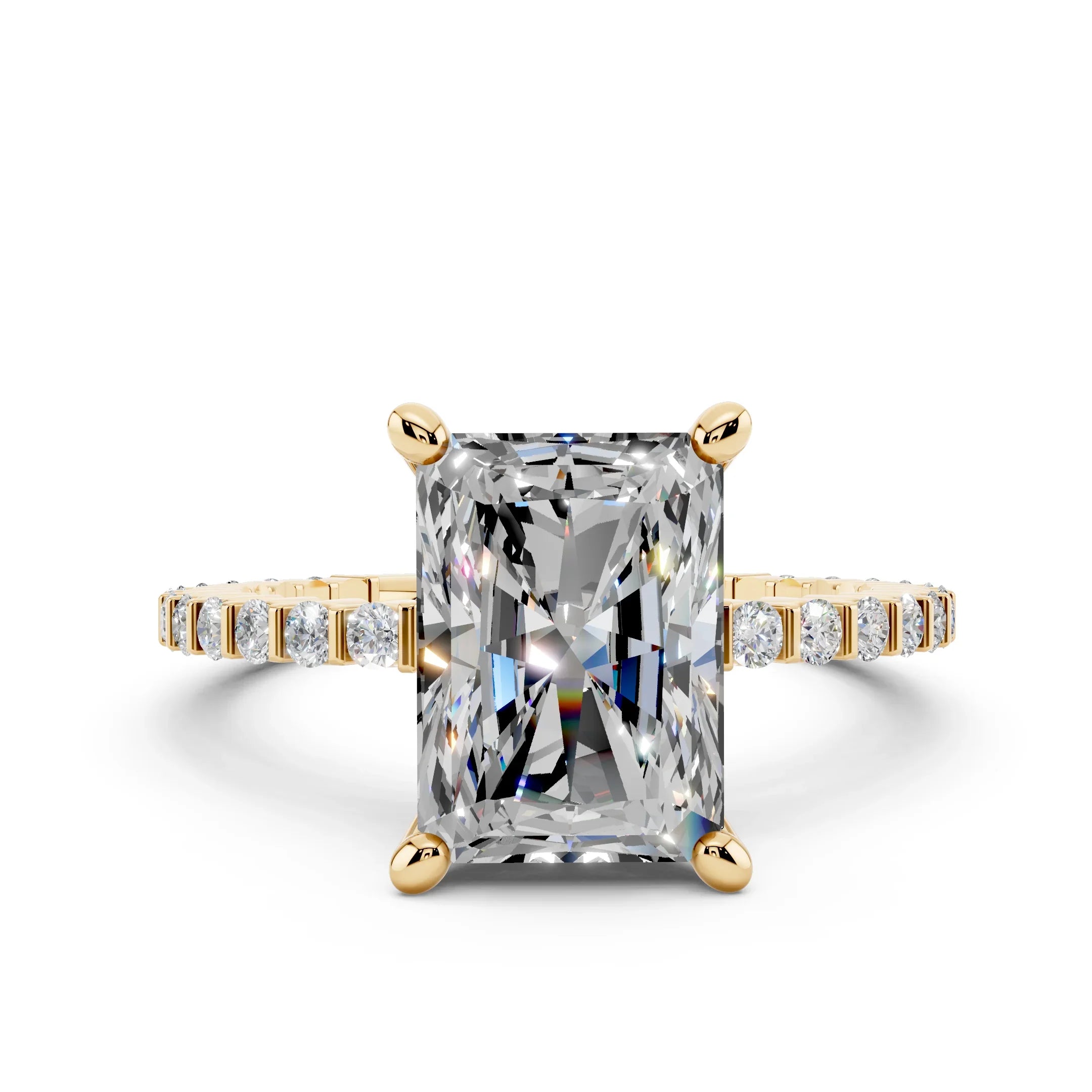 Radiant-cut diamond engagement ring with yellow gold band and pavé accent stones