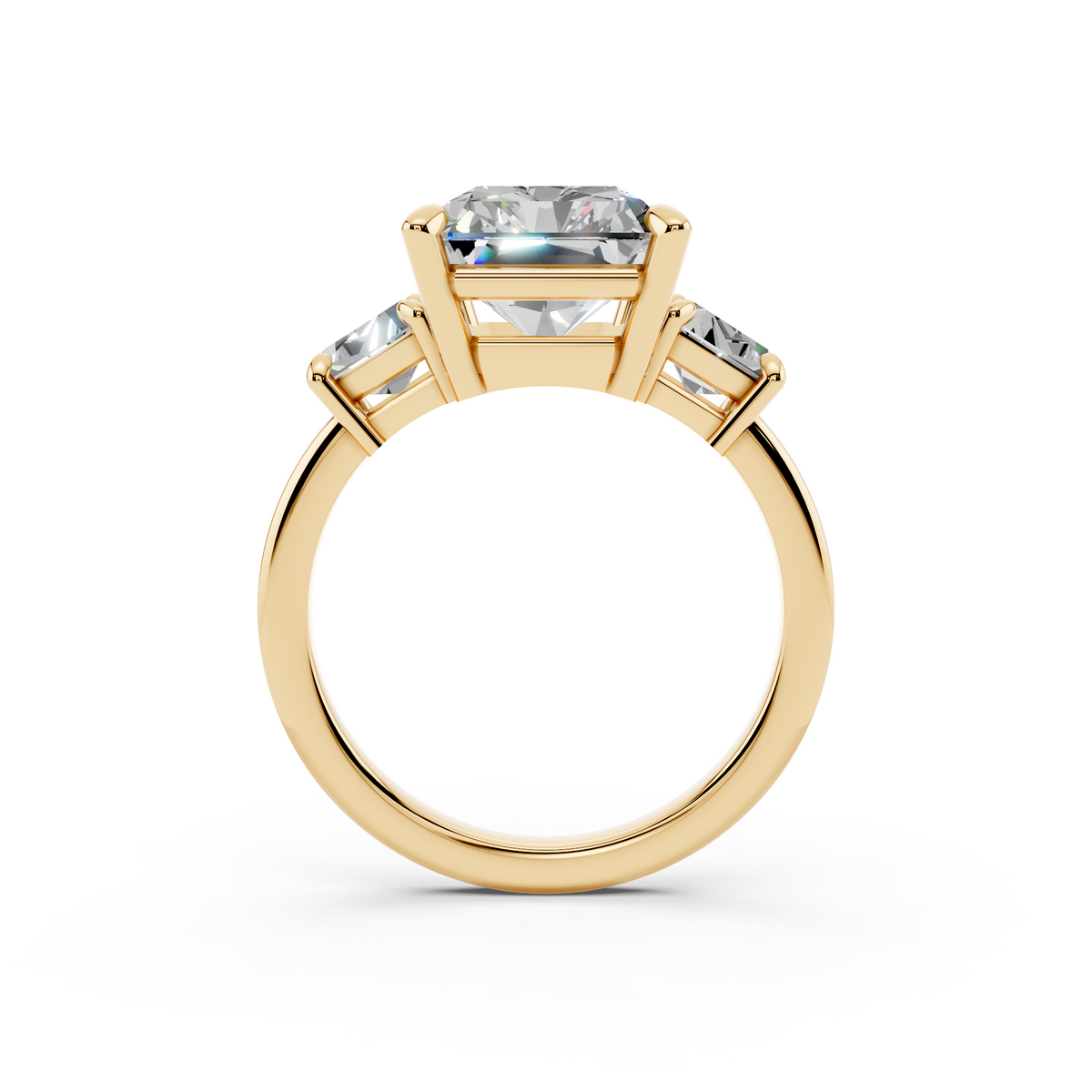 Yellow gold three stone engagement ring with emerald-cut center diamond