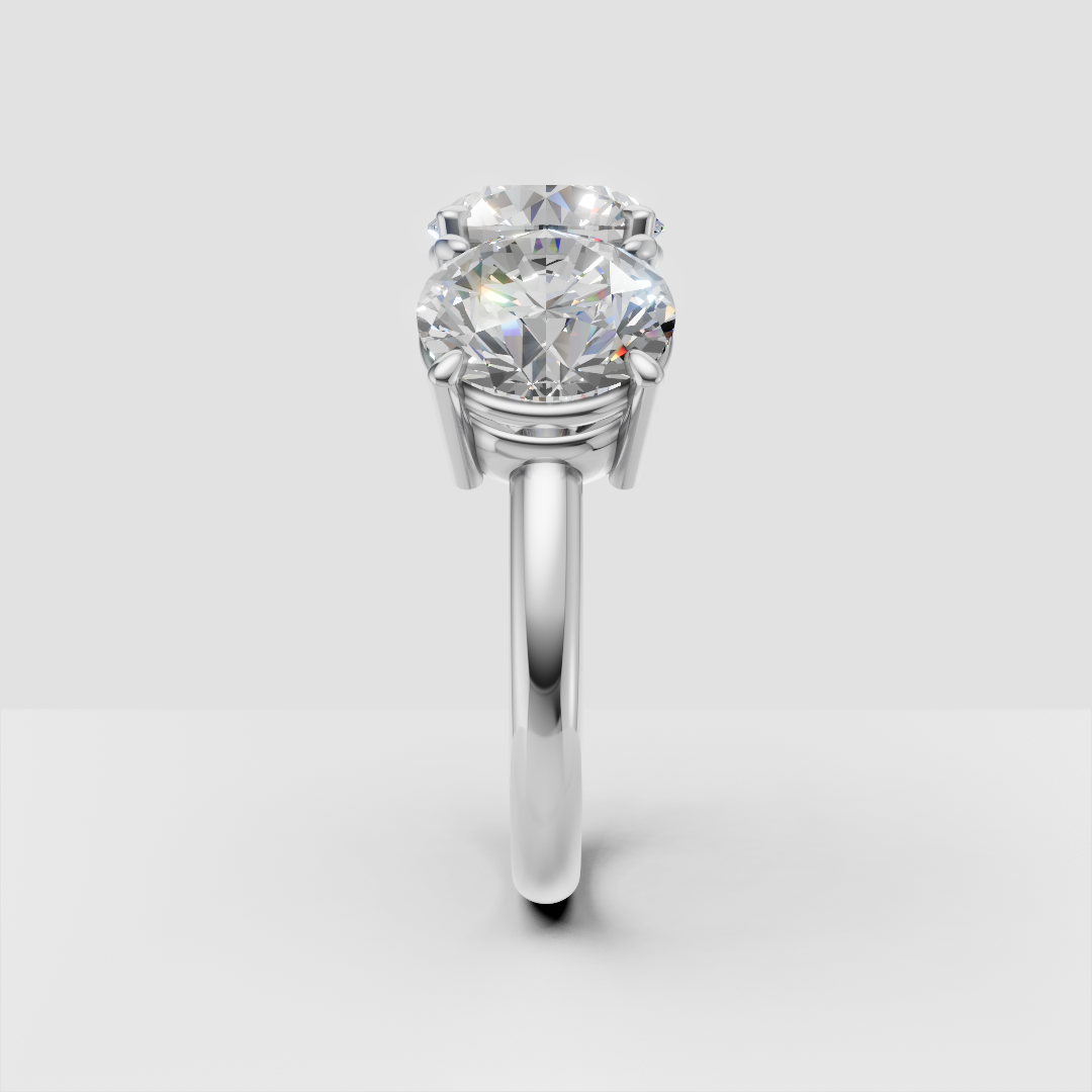 Two-stone diamond engagement ring with round brilliant-cut gems on white gold band