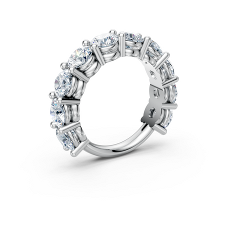 Platinum eternity band with round brilliant cut diamonds in prong setting