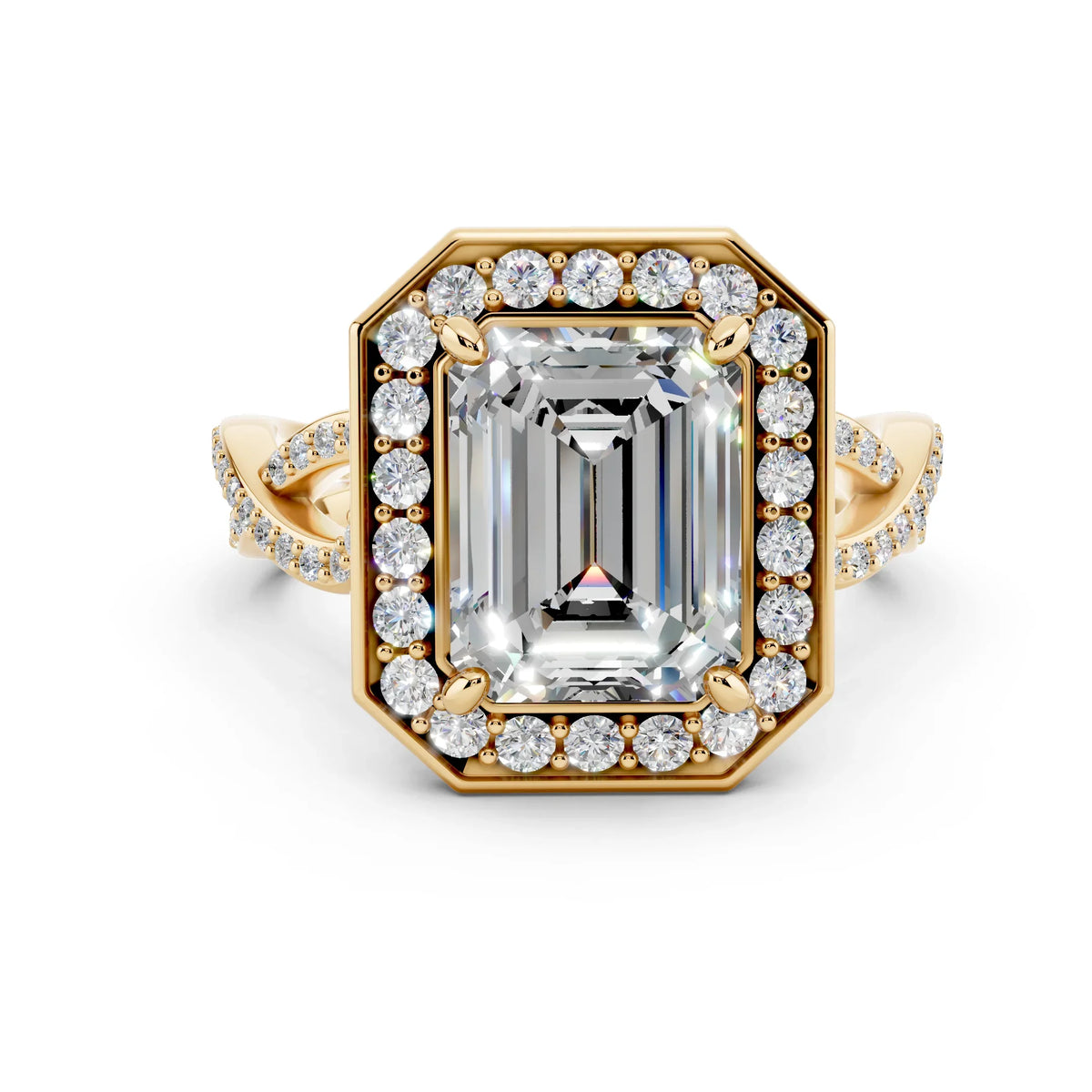 Emerald cut diamond engagement ring with halo setting and twisted yellow gold band
