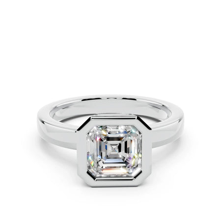 Asscher cut diamond engagement ring in a white gold bezel setting, minimalist design