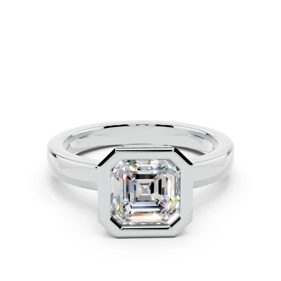 Asscher cut diamond engagement ring in a white gold bezel setting, minimalist design