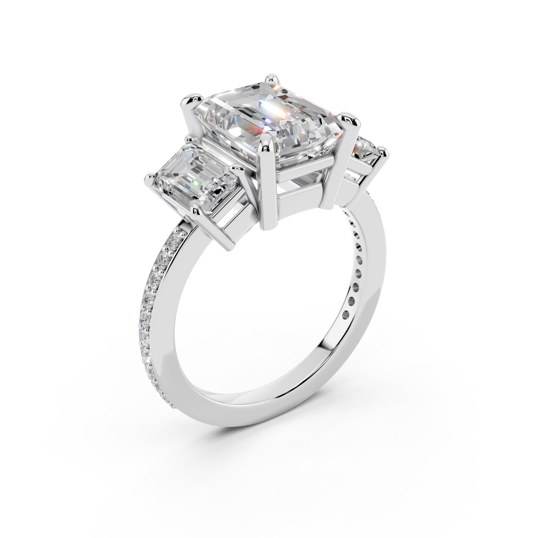 Three stone emerald cut diamond engagement ring with pavé band in white gold