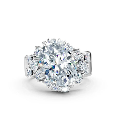 Oval cut diamond engagement ring with halo and side stones in white gold setting