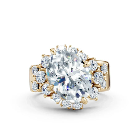Oval cut diamond engagement ring with halo and side stones in yellow gold setting