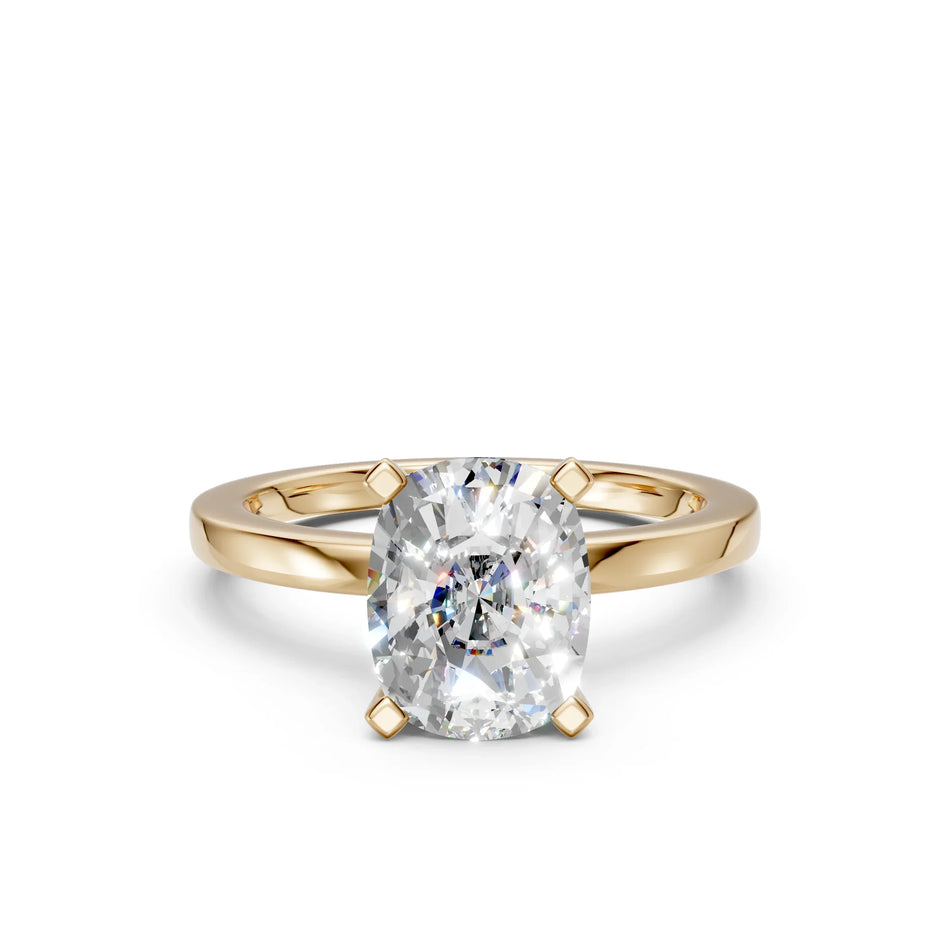 Oval diamond engagement ring in yellow gold, custom made-to-order jewelry with payment plans available