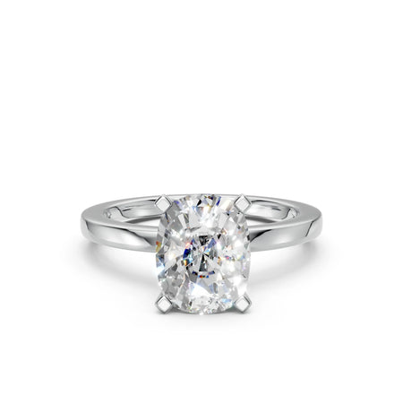 Elegant oval-cut diamond engagement ring with four-prong setting in white gold or platinum