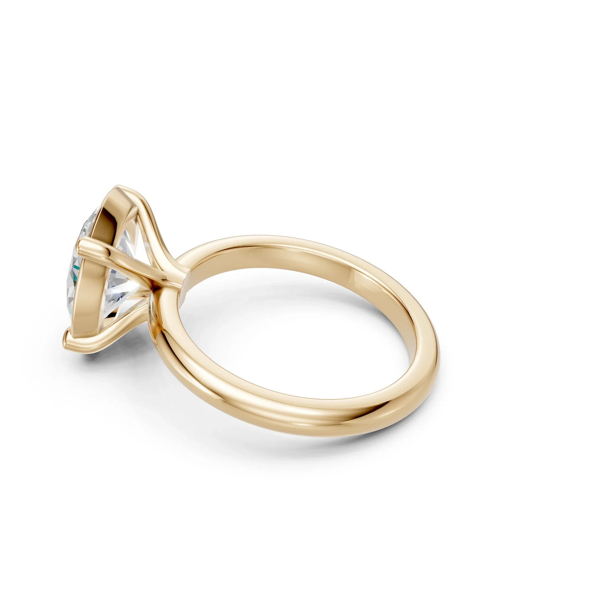 Yellow gold solitaire engagement ring with round diamond, custom design