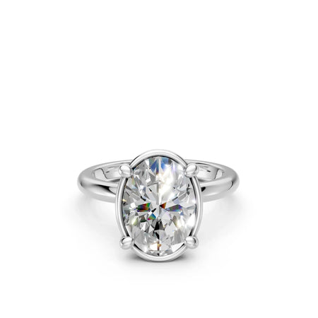 Elegant oval diamond engagement ring with four-prong setting in white gold