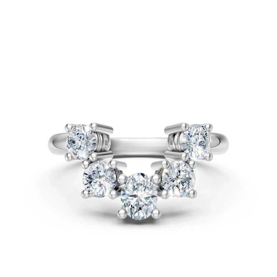 Three-stone diamond engagement ring with round brilliant center and side stones, white gold band