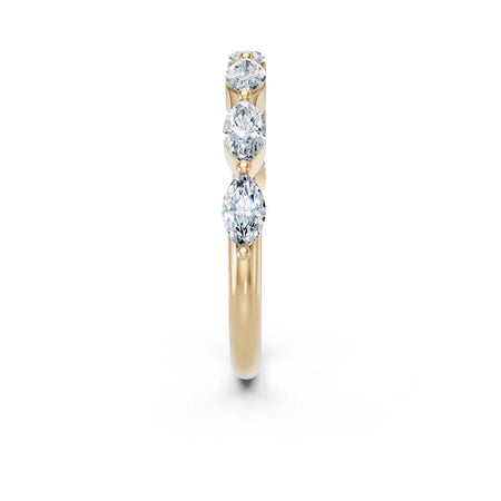 Elegant gold engagement ring with three marquise-cut diamonds, perfect for custom designs.