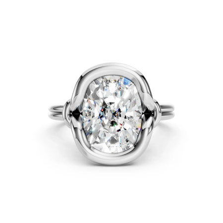 Elegant oval diamond engagement ring with unique twisted band design