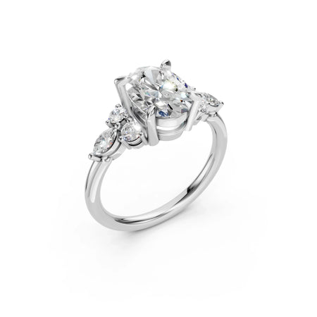 Elegant engagement ring with oval diamond center and side accents, crafted in white gold