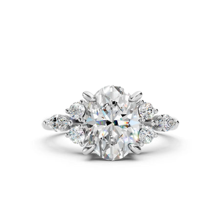 Elegant oval diamond engagement ring with side accents, custom-made for your dream proposal