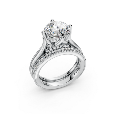 Round brilliant cut diamond engagement ring with a pavé diamond wedding band set.