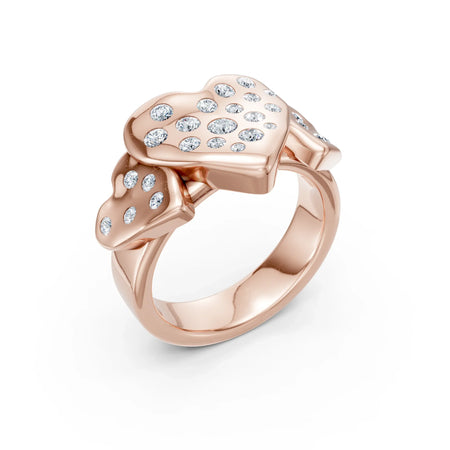 Rose gold ring featuring interlocking diamond-encrusted heart designs