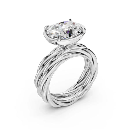 Silver engagement ring featuring a twisted band and a large round diamond center stone.