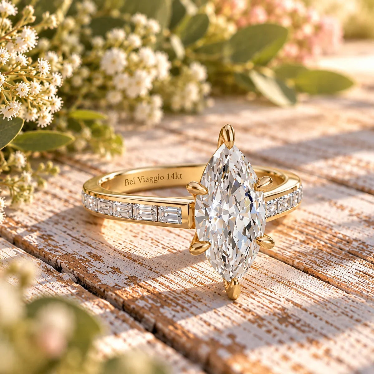 Marquise diamond engagement ring with baguette setting in yellow gold by Bel Viaggio Designs