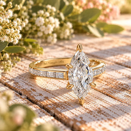 Marquise diamond engagement ring with baguette setting in yellow gold by Bel Viaggio Designs