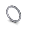lab grown diamond wedding band with pavé setting on white background