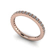 Rose gold diamond eternity wedding band with pavé setting on white background