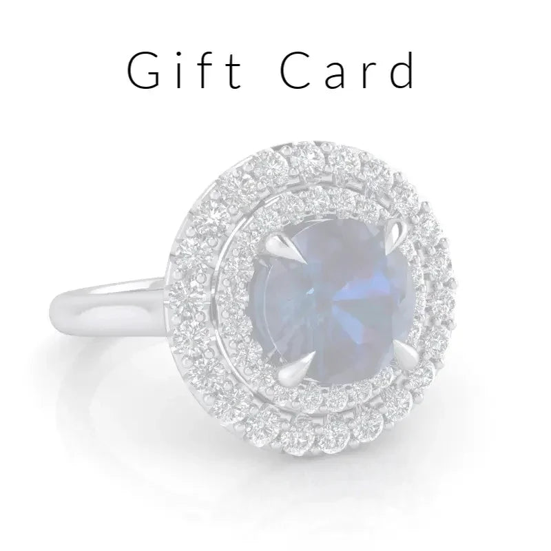 Gift card with image of a diamond halo ring featuring a blue gemstone center