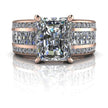 Radiant cut diamond engagement ring with rose gold band and pavé side stones