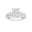 Radiant cut lab grown diamond engagement ring with side accent diamonds on a white gold band