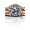 Rose gold twisted band engagement ring with oval diamond halo setting